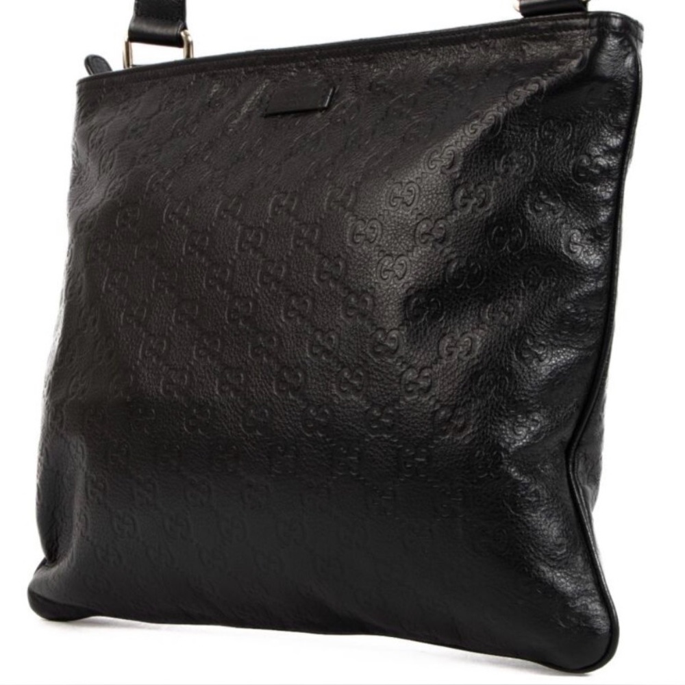 Like new large Gucci Guccissima black messenger bag.
